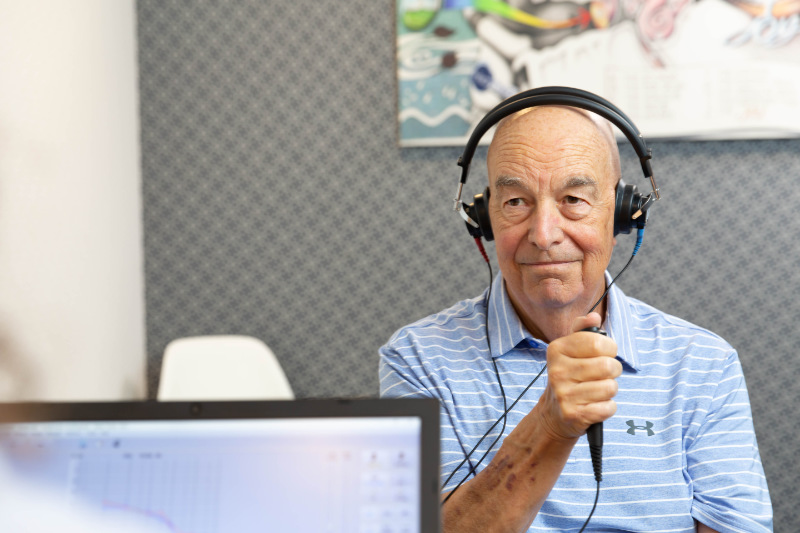 hearing test-assessment man with headphones hearing test-assessment man with headphones