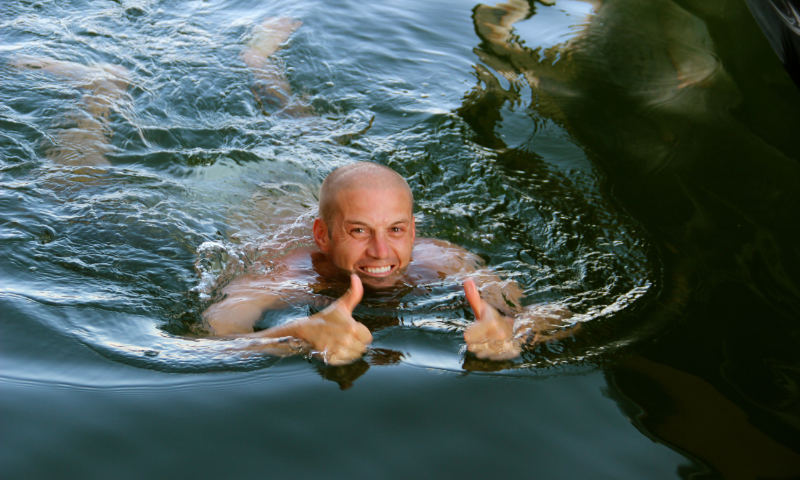 man swimming ear plugs by adam-winger man swimming ear plugs